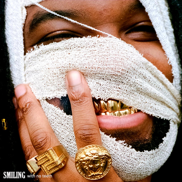 Genesis-Owusu-Smiling-With-No-Teeth.jpg
